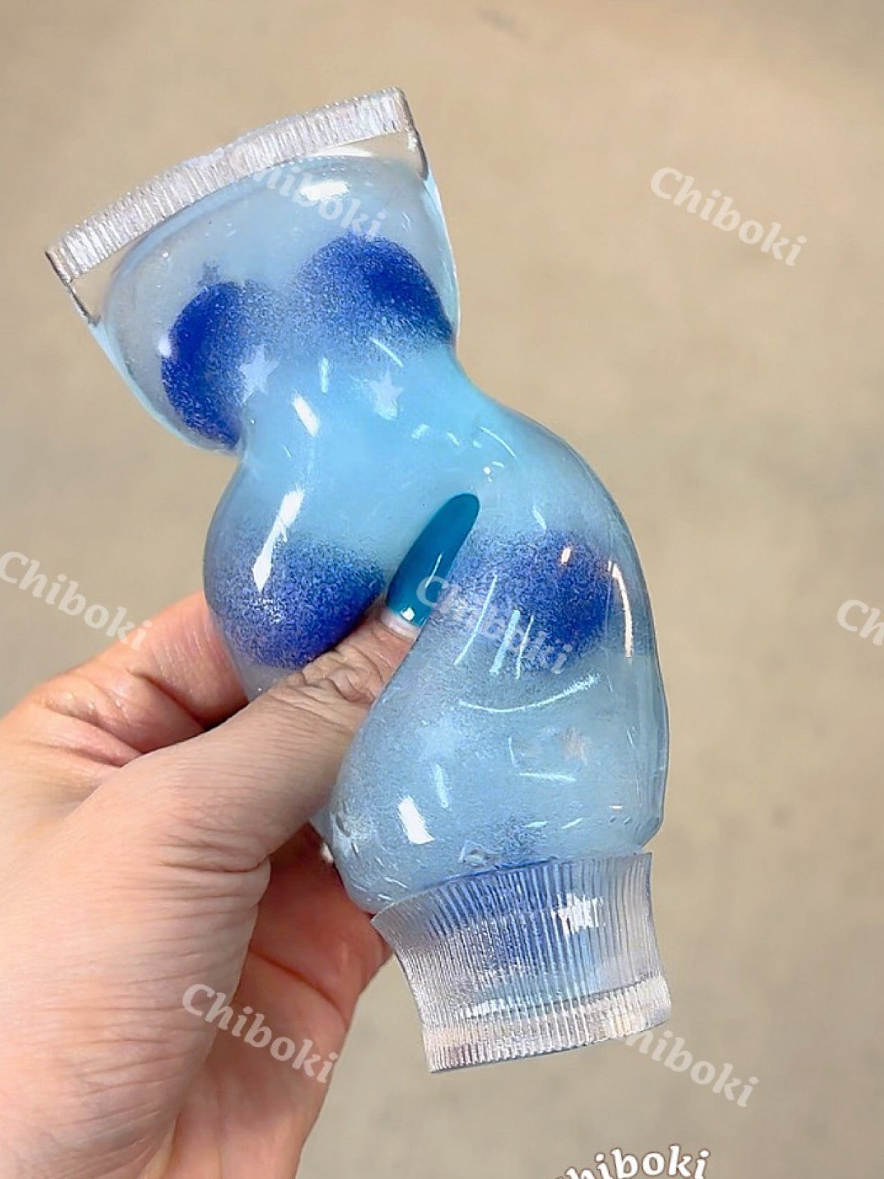 Jam tube squishy squeezed showing no-rebound texture