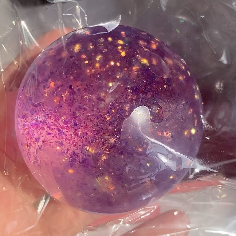 Pearlescent maltose squishy balls in seven aurora colors